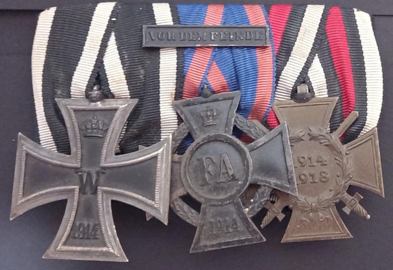 GERMAN WW1 IRON CROSS GROUP OF THREE .